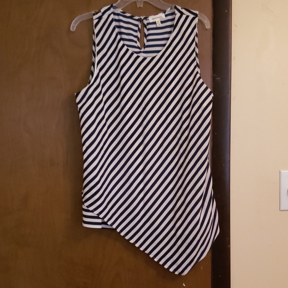 Sleeveless top with asymmetrical draped front.